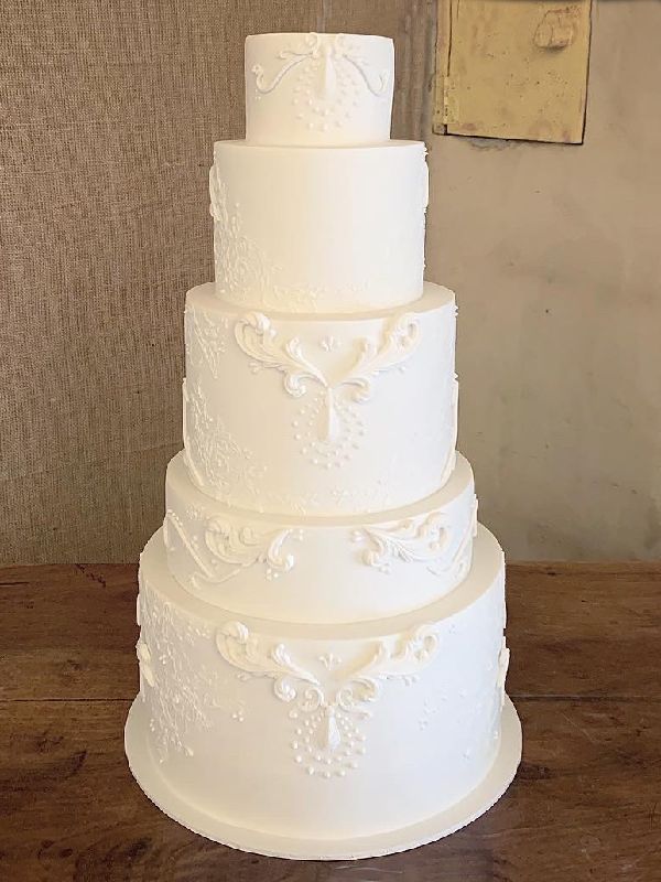 white fondant embelished cake